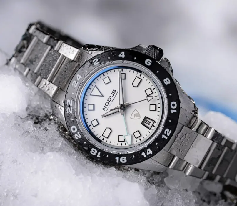 White-dial adventure watch in the snow