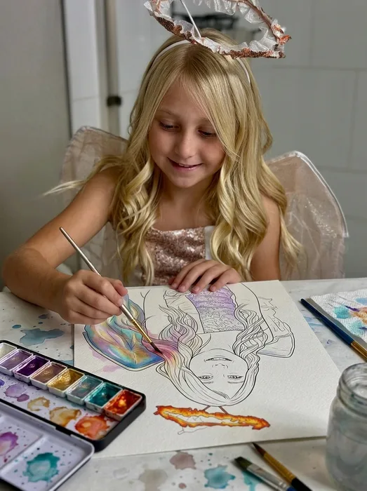 Girl painting a custom watercolor portrait